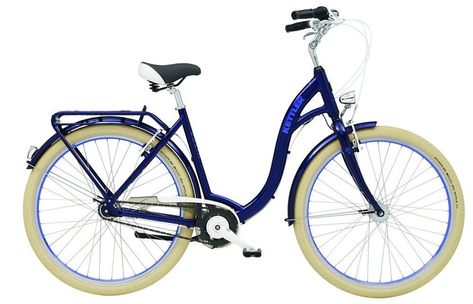 A blue bicycle with white tires on a white background.