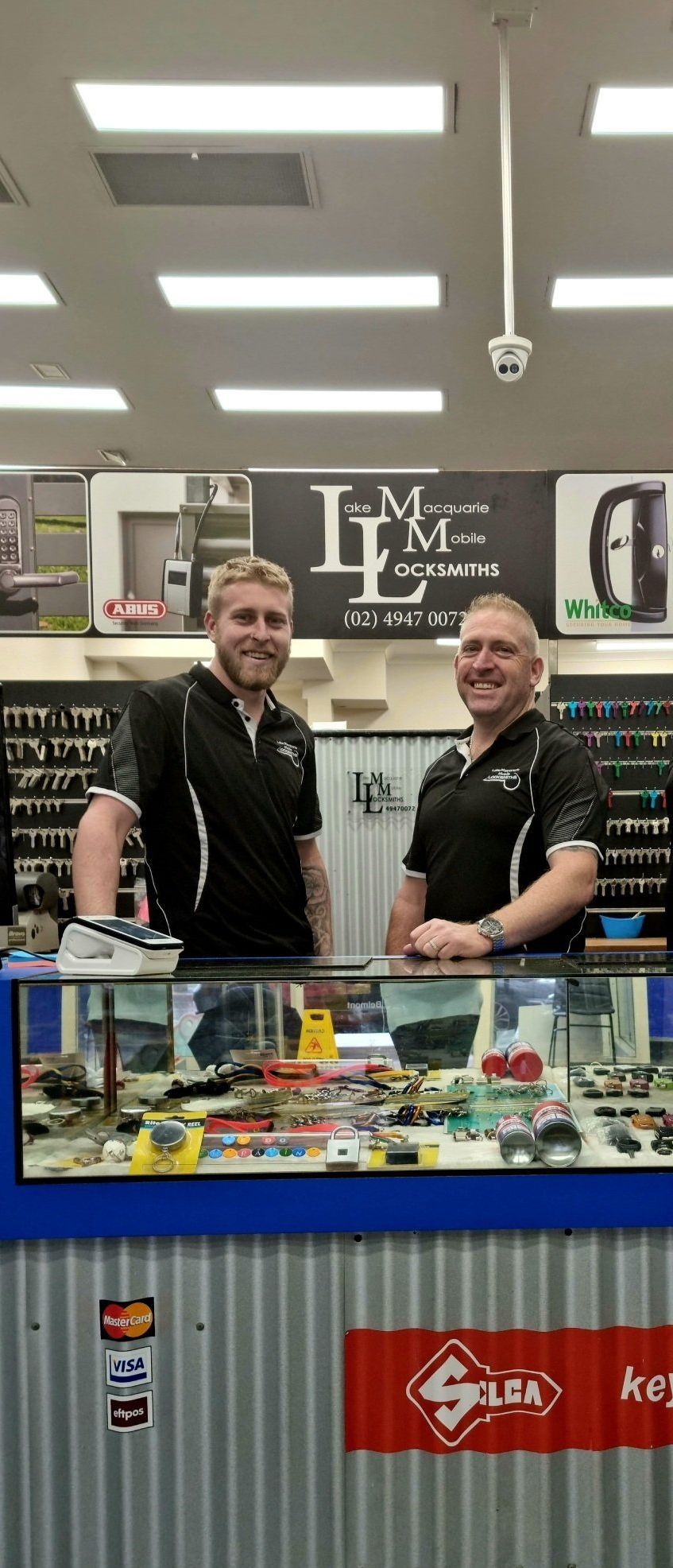 The Lake Macquarie Mobile Locksmith Team In The Shop — Lake Macquarie Mobile Locksmiths in Belmont, NSW