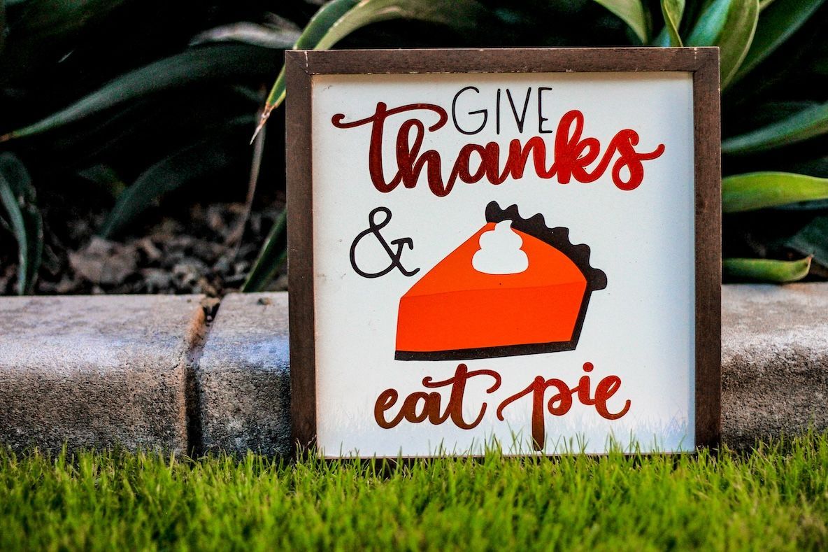 Image provided by RattikinLaw. Photos shows sign with text, 'Give Thanks & Eat Pie.'