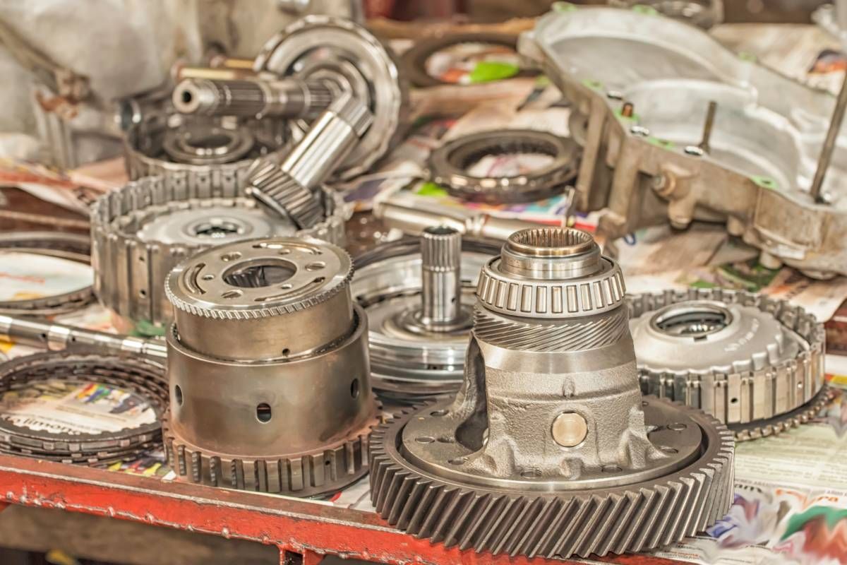 Automatic transmission parts on a table in a mechanic shop near Sharonville, OH