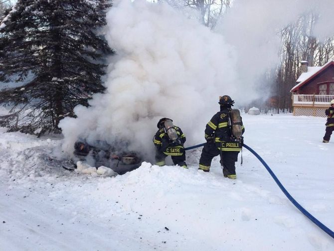 PTVFC putting out a car fire on a snowy Winter day