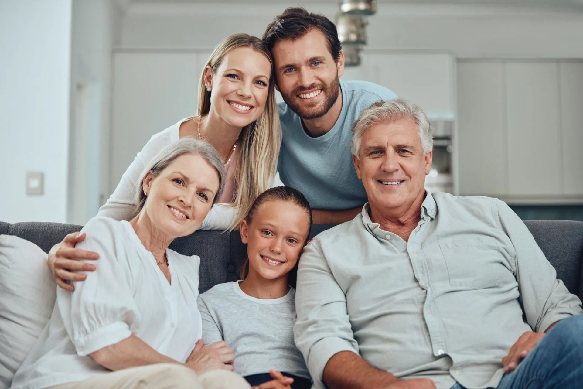 photo of family gathered on the couch