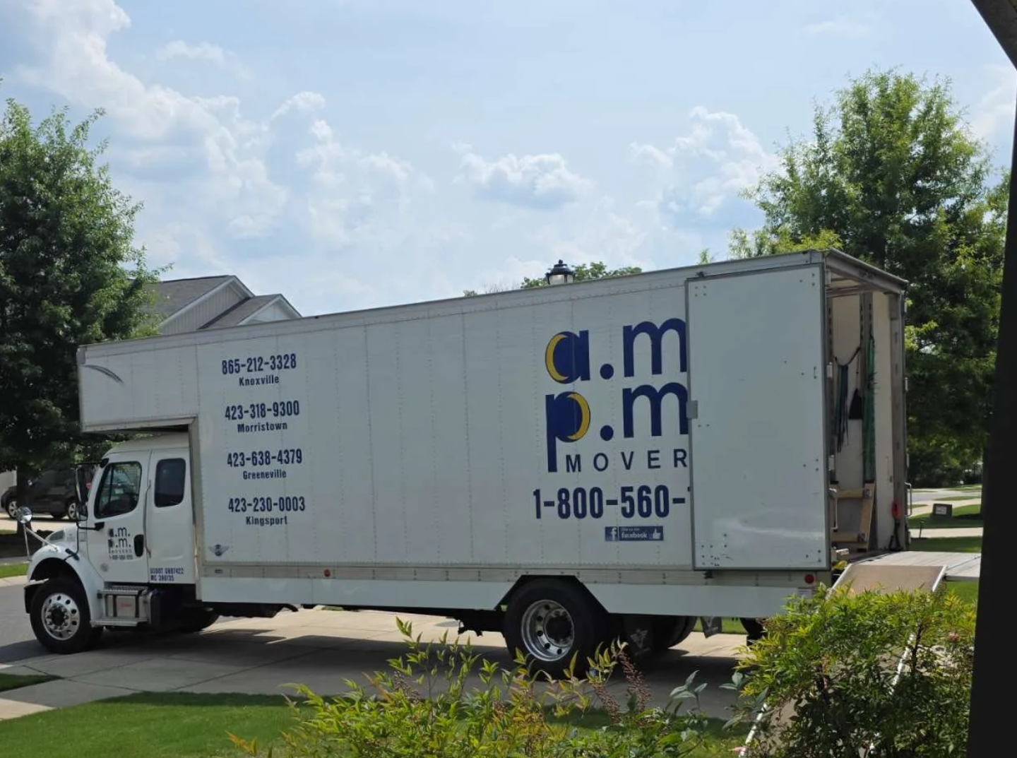 Delivery Men Unloading Boxes From Truck - Movers in Morristown, TN