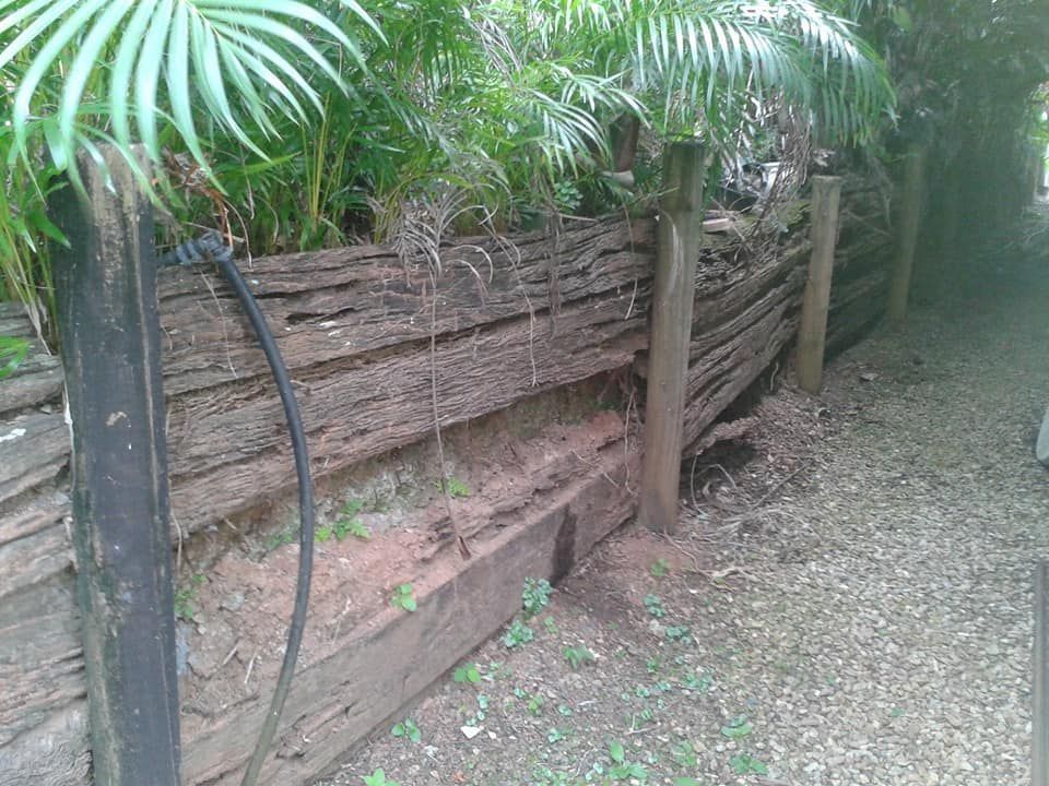 Damaged Wood Fence — Natraspray Lismore in Goonellabah, NSW