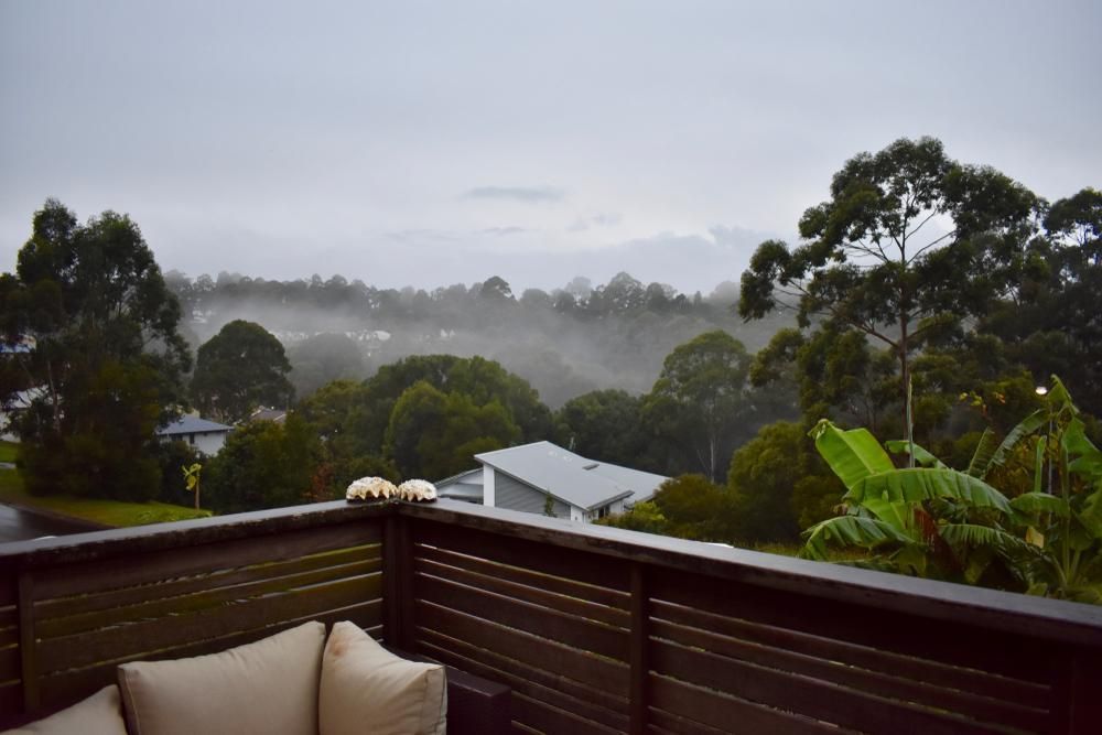 A Balcony with A View of Trees and Houses on A Cloudy Day — Natraspray Lismore in Goonellabah, NSW