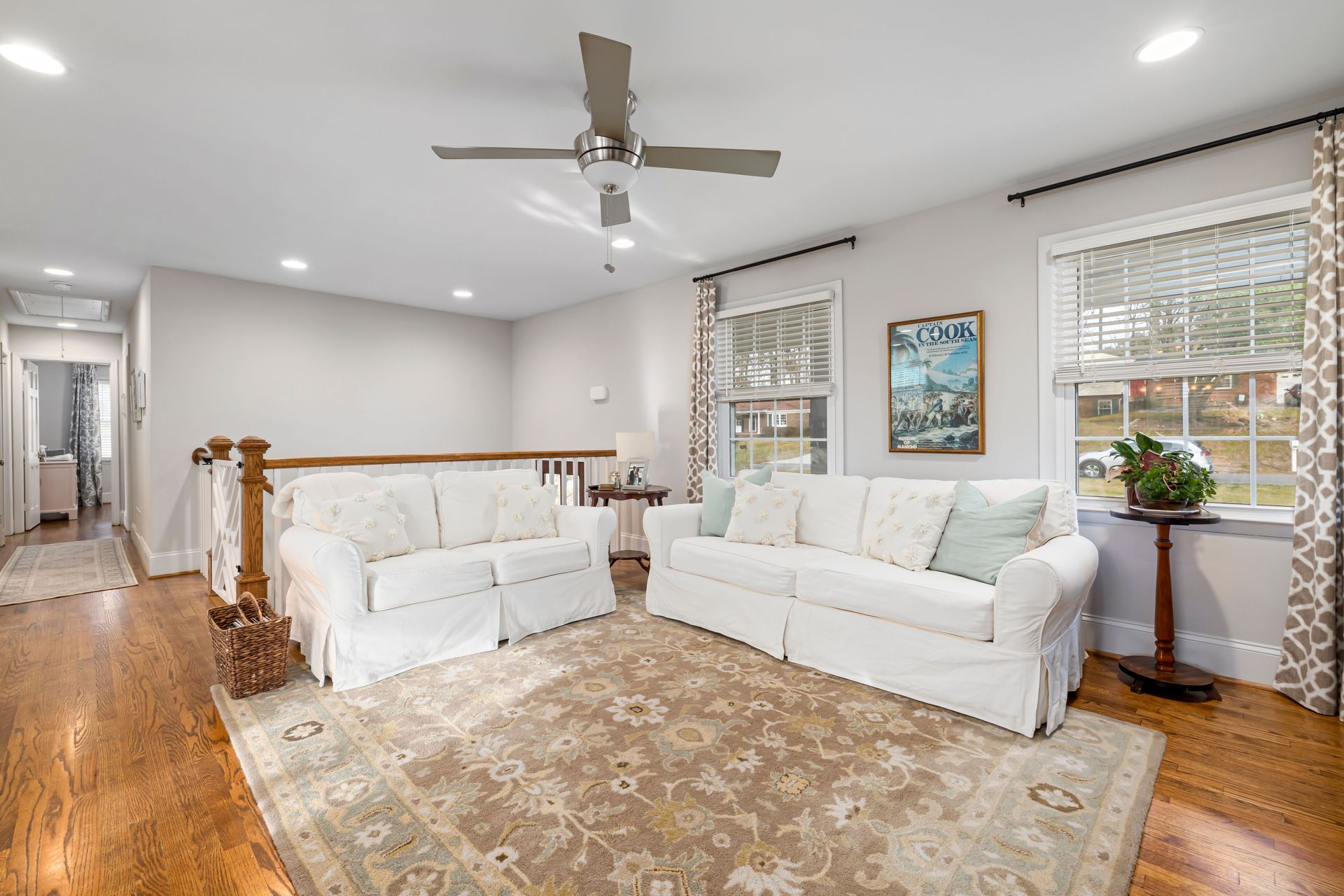 Refinished hardwood floor in a bright Sevierville, TN living room, restored by Heavy Dutys Alternate