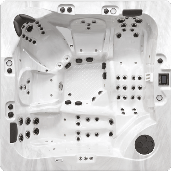 Une photo en noir et blanc d'un jacuzzi avec beaucoup de jets.