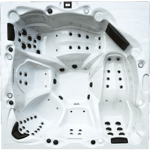 Un grand jacuzzi blanc avec beaucoup de trous