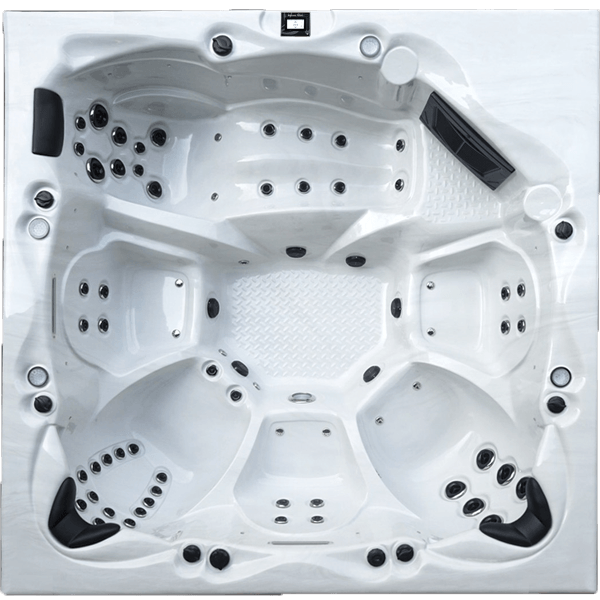 Un grand jacuzzi blanc avec beaucoup de jets dessus