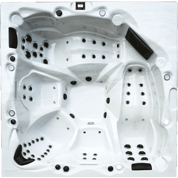 Un grand jacuzzi blanc avec beaucoup de trous