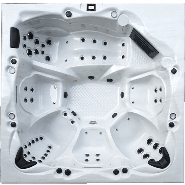 Un grand jacuzzi blanc avec beaucoup de jets dessus
