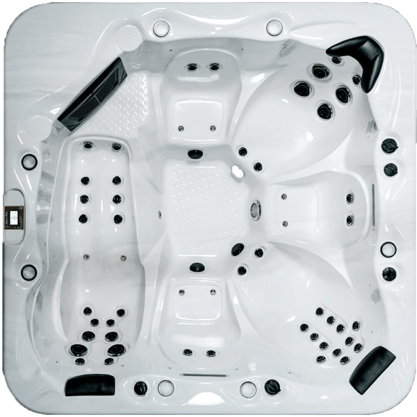 Un jacuzzi blanc avec des points noirs dessus