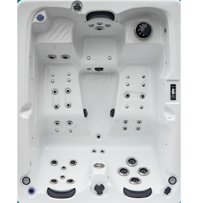 Un jacuzzi blanc avec beaucoup de jets dessus
