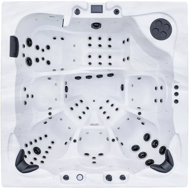 Un jacuzzi blanc avec des points noirs dessus