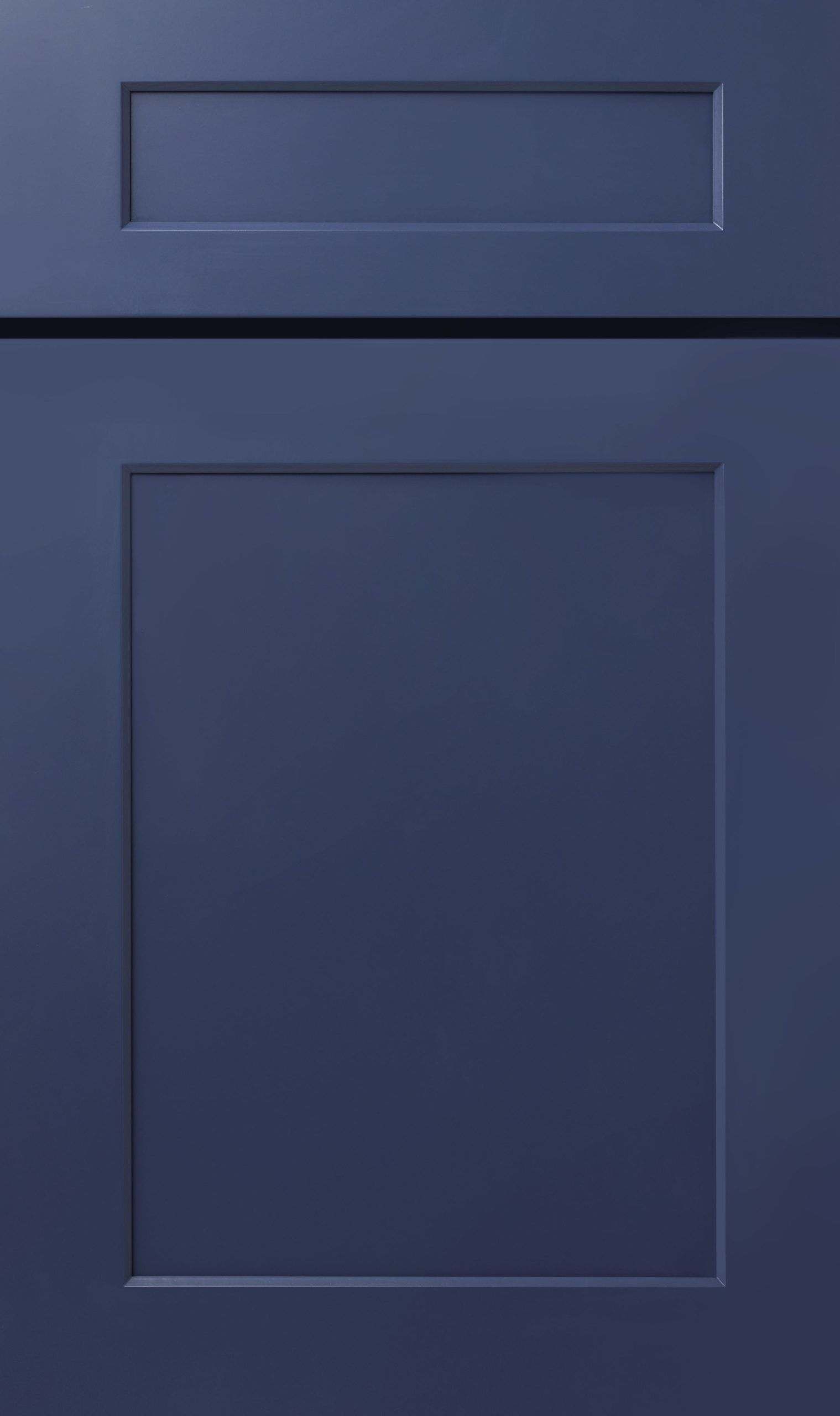 Navy blue cabinet door with a recessed panel and small upper rectangle.