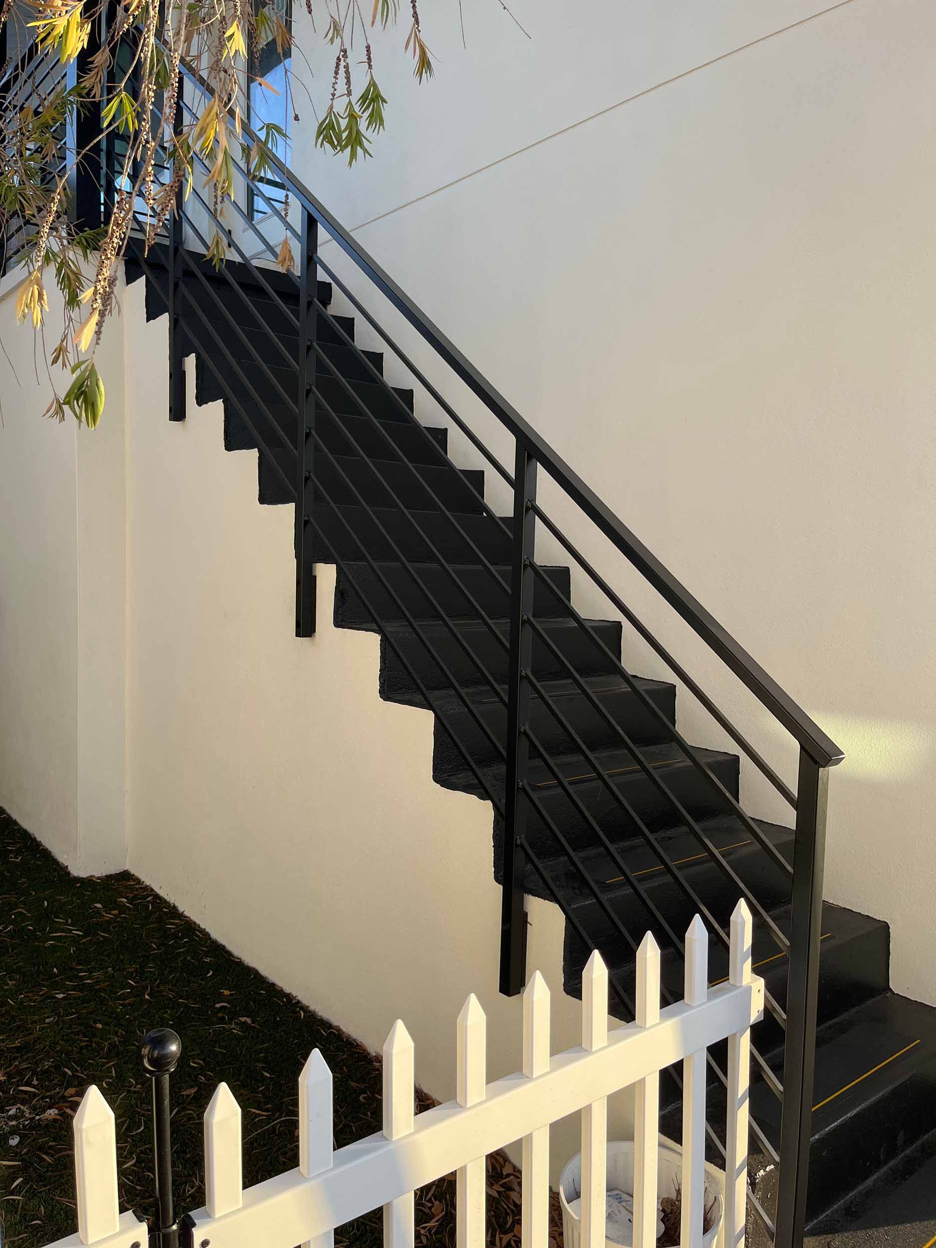 Office building in Marana, AZ with modern metal stair railings