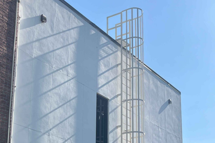 ladder with step over platform at the roof