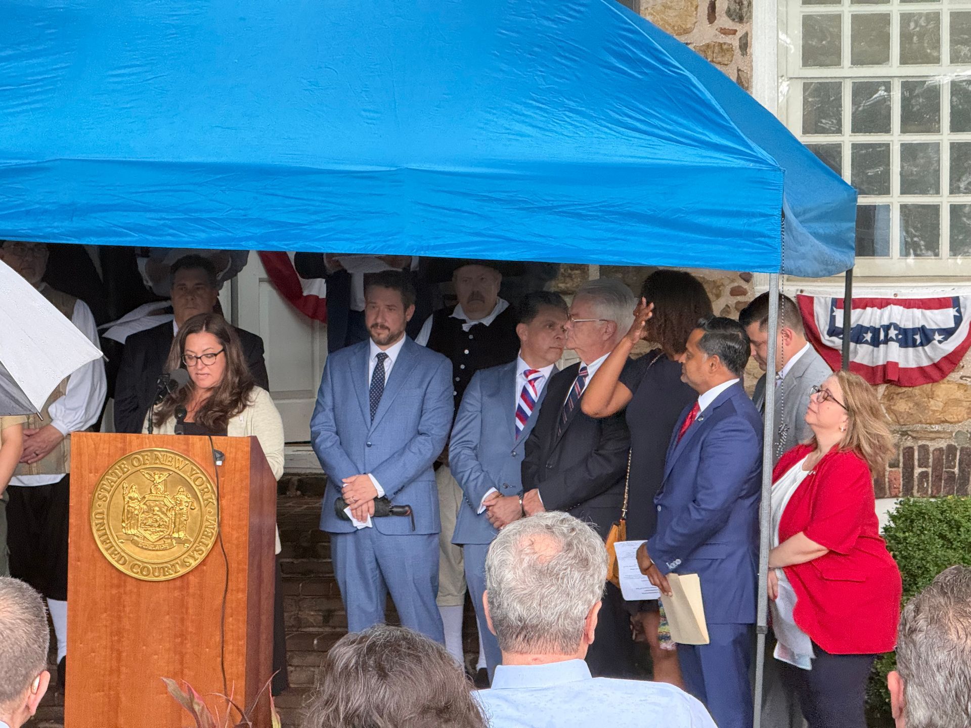 Nicole Ajello- Merlino, court attorney to Judge Mary Kavanagh, reads from the Declaration of Independence as Richmond County court officials 
celebrate its 250th anniversary at Conference House Park in Tottenville on Thursday, July 9, 2026. (Owen Reiter for the Advance/SILive.com