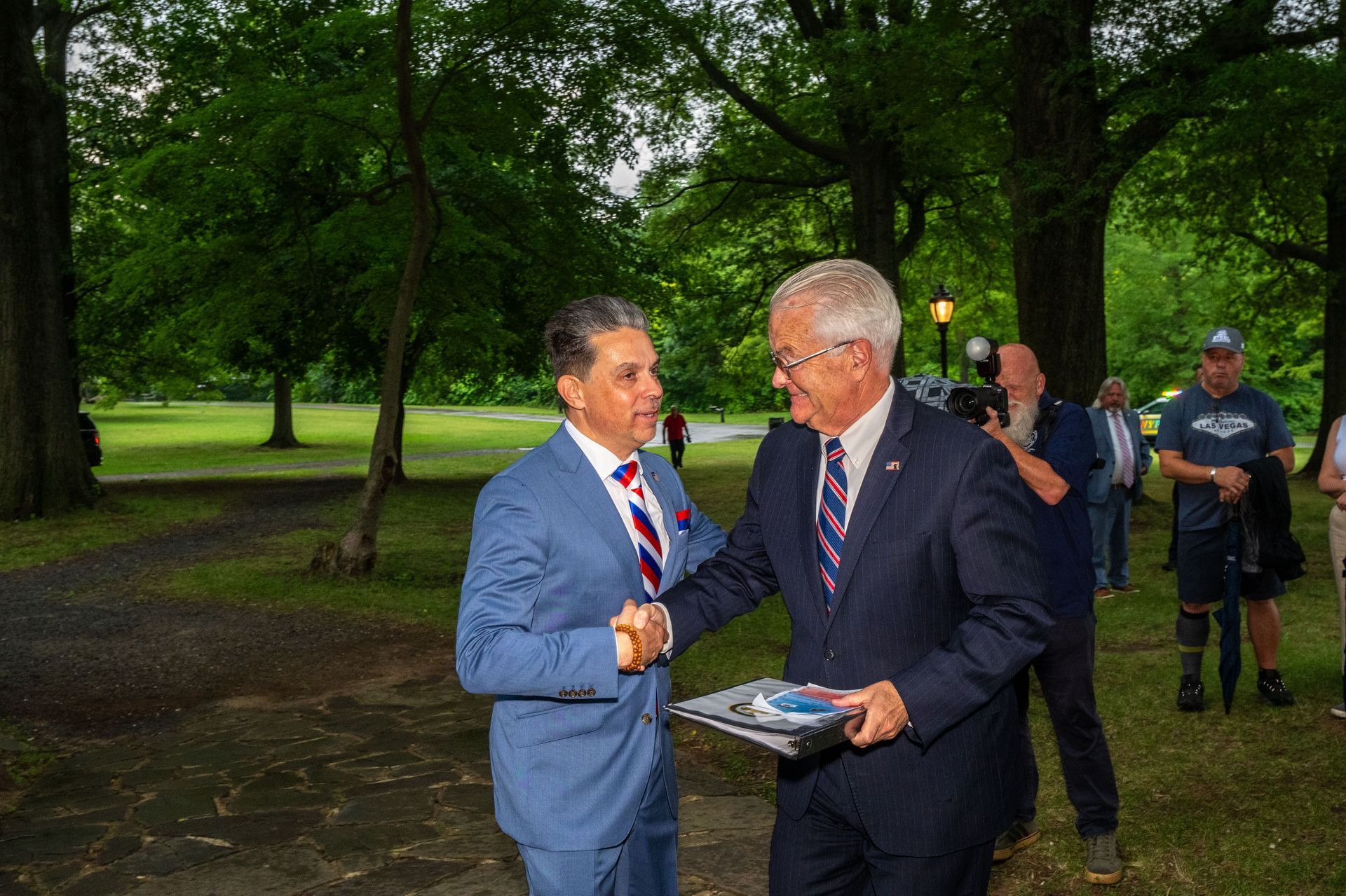 Administrative Judge Raymond L. Rodriguez greets District Attorney Michael E. McMahon as Richmond County court officials celebrate the 250th anniversary of the Declaration of Independence at Conference House Park in Tottenville on Thursday, July 9, 2026.
(Owen Reiter for the Advance/SILive.com)
