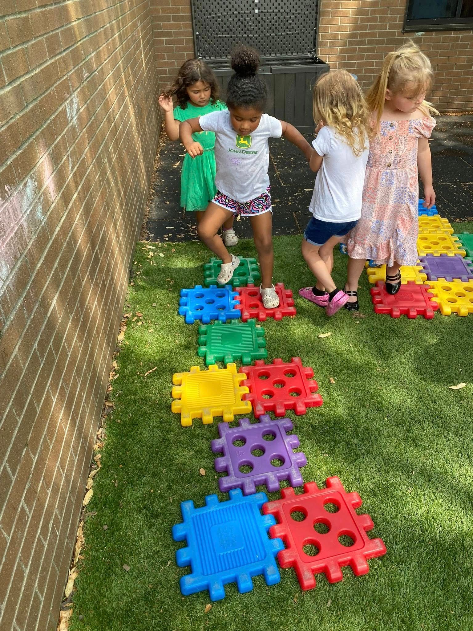 teacher teaching children - child learning center in Moline IL teacher teaching children - child learning center in Moline IL