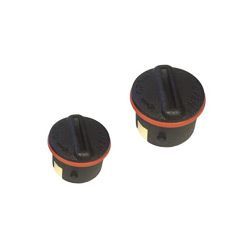 Two black plastic caps with a red ring around them on a white background.
