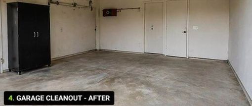Empty garage with concrete floor and white walls after cleanout