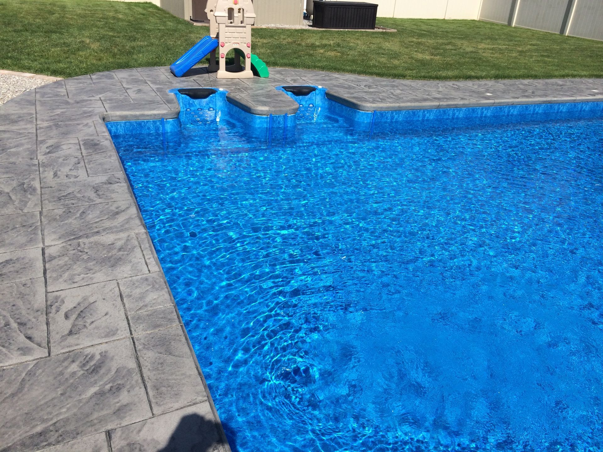 In-ground pool with hydrotherapy