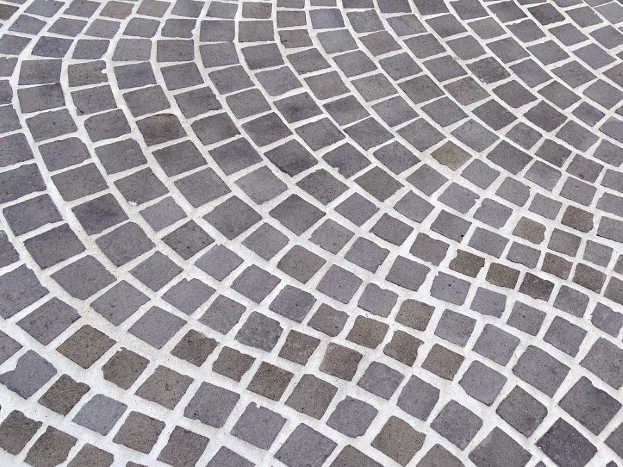 A Close Up of a Circular Pattern of Bricks on a Sidewalk — Golden City Brick & Landscape in Gympie, QLD