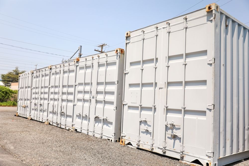 A Row of Shipping Storage Units Standing on a Gravel Lot — King Street Storage Emerald in Emerald, QLD
