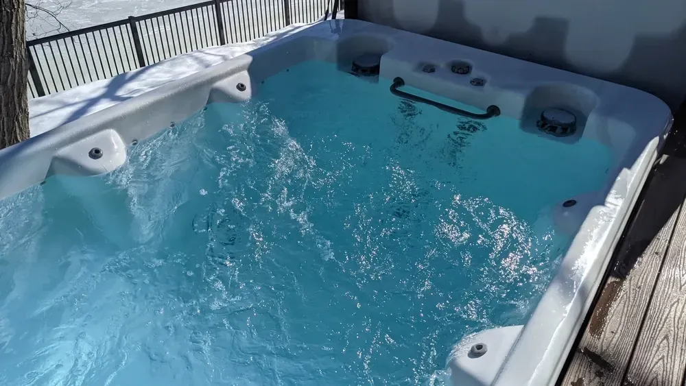 A High-angle View of a White Hot Tub Filled — Sun Cool Pools & Spas in Maryborough, QLD