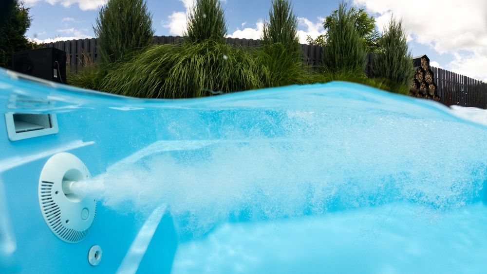 Underwater View of a Light Blue Hot Tub — Sun Cool Pools & Spas in Maryborough, QLD