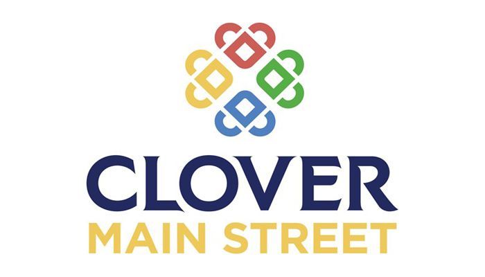 Clover Main Street logo with multicolored clover icon above blue and gold text