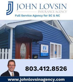John Lovsin Insurance Agency sign with blue house, agent headshot, phone number and website.