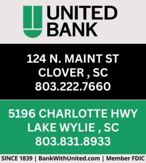 United Bank sign listing Clover and Lake Wylie, SC branch addresses and phone numbers