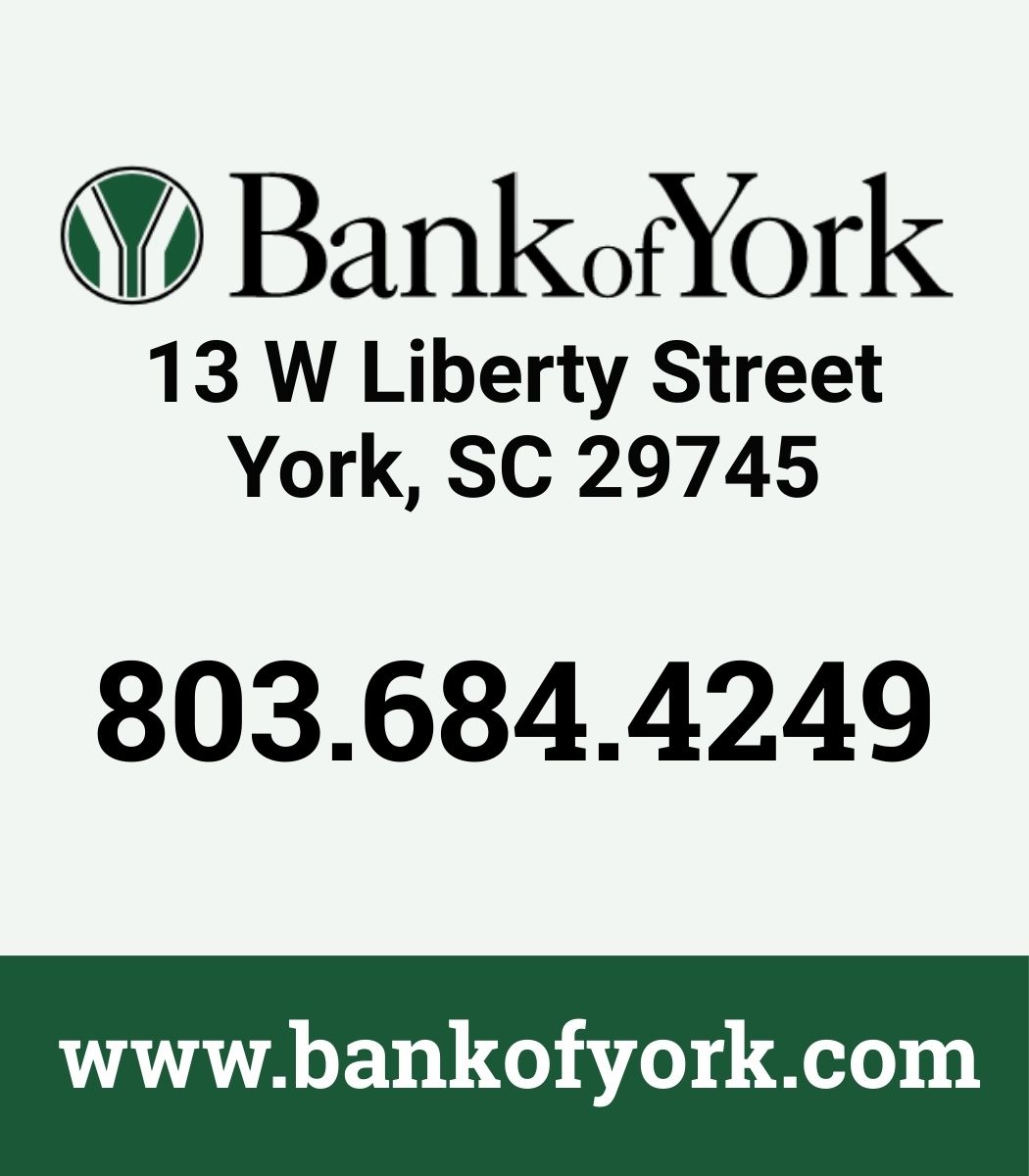 Bank of York sign with address, phone number, and website in green and black