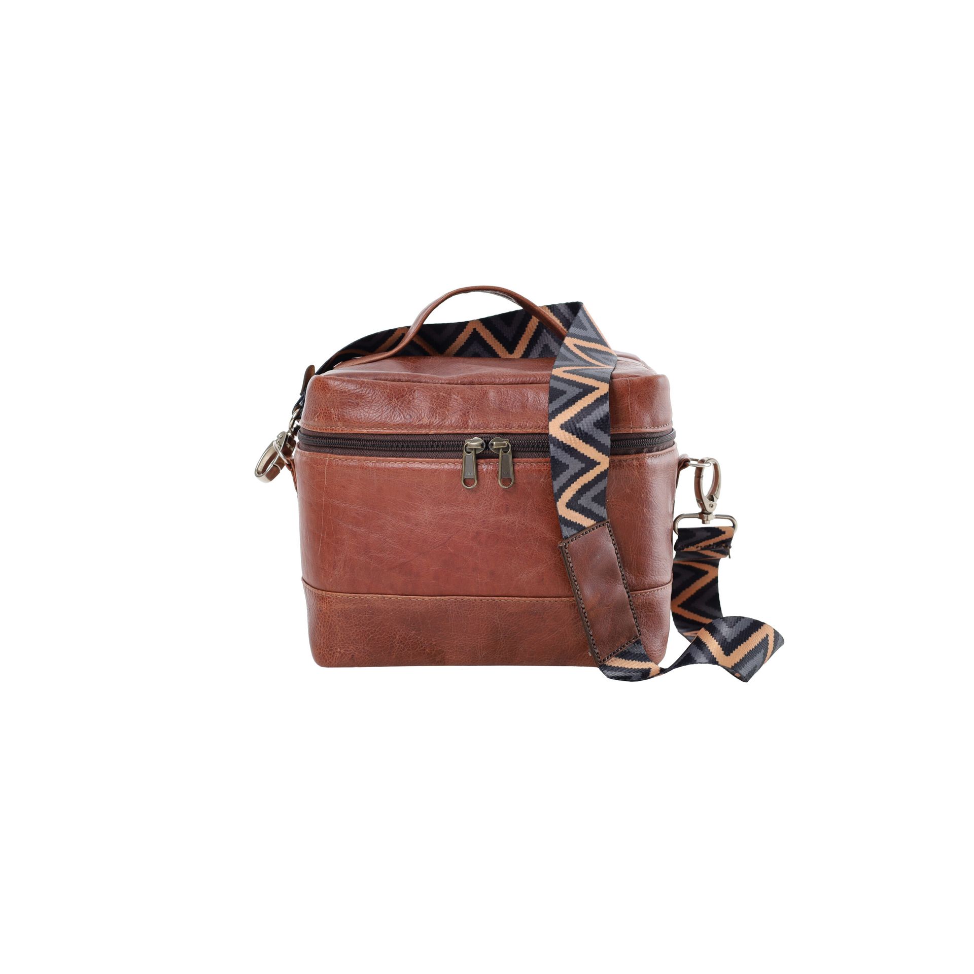 Brown leather crossbody bag with a patterned strap on a white background