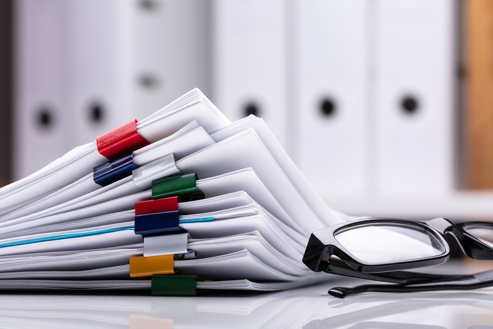 Documents on Table — Los Angeles, CA — Azura Investigations Documents on Table — Los Angeles, CA — Azura Investigations