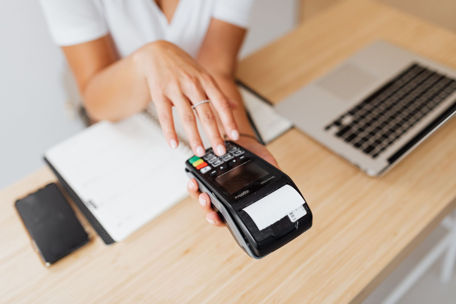 Payment terminal processing a card for dual pricing and surcharge fee recovery