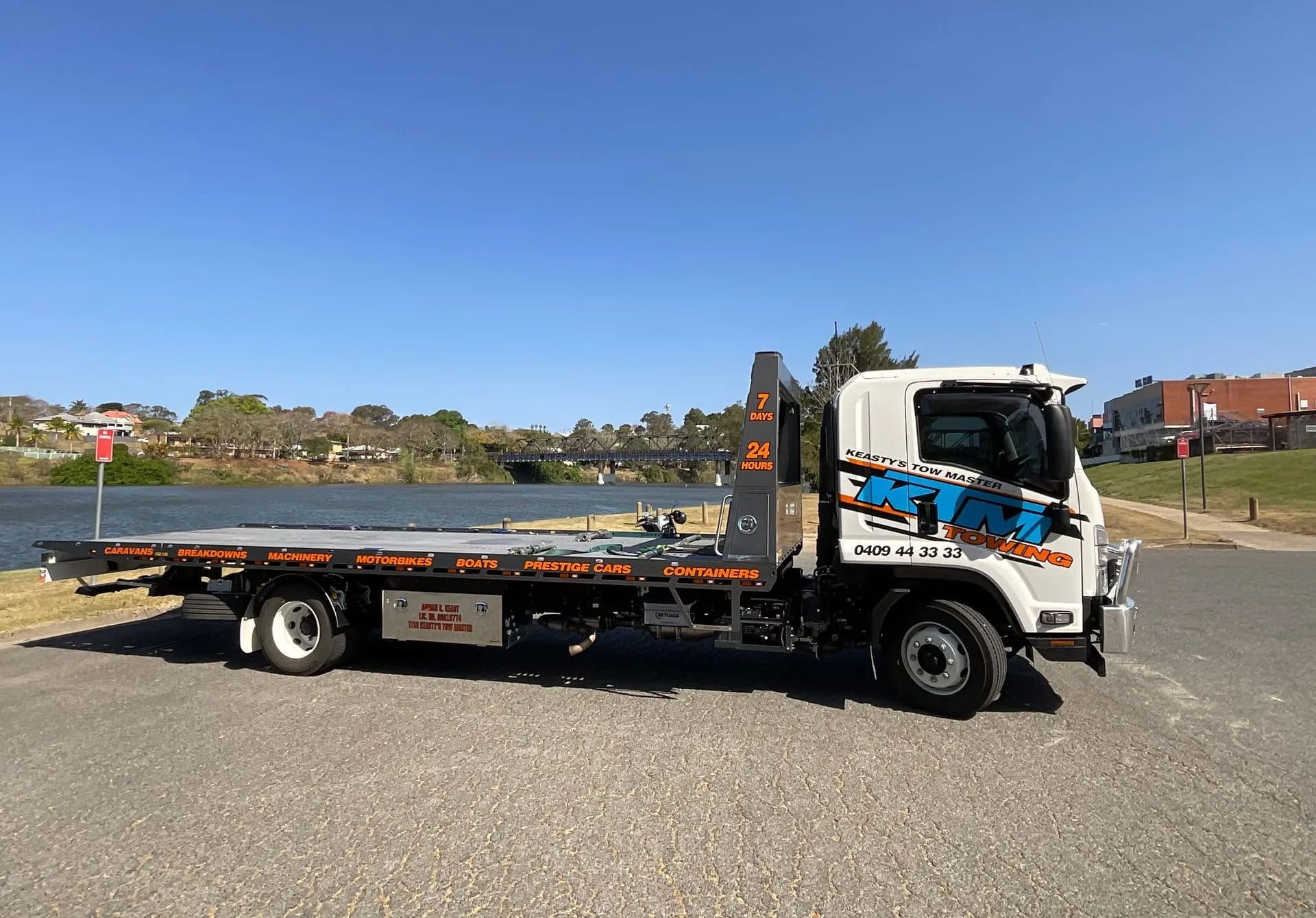 A Tow Truck Is Parked On The Side Of The Road — KTM Towing In Wauchope, NSW