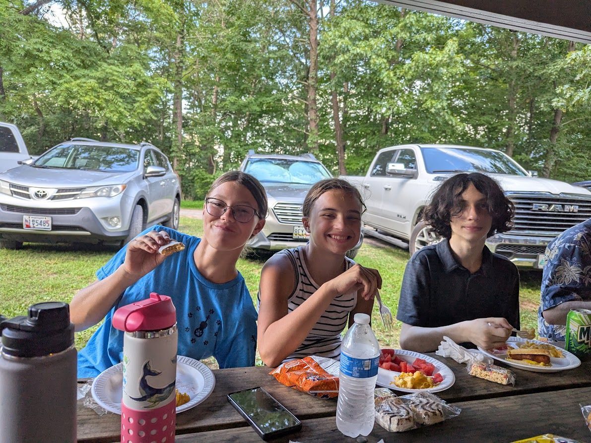 HUMC Youth enjoying the Wednesday night dinner during CAMP JOY