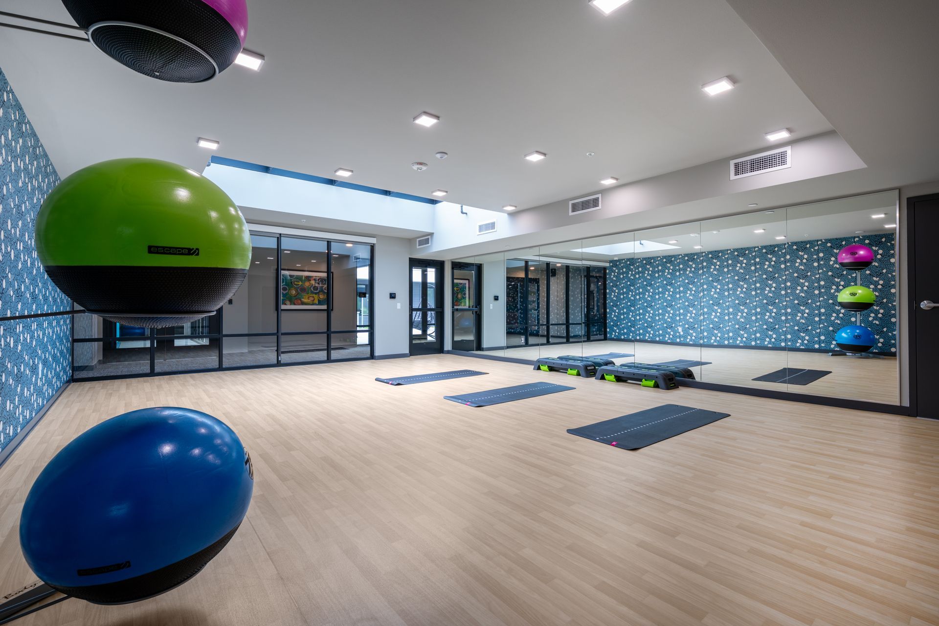 stretch studio with yoga mats and skylights