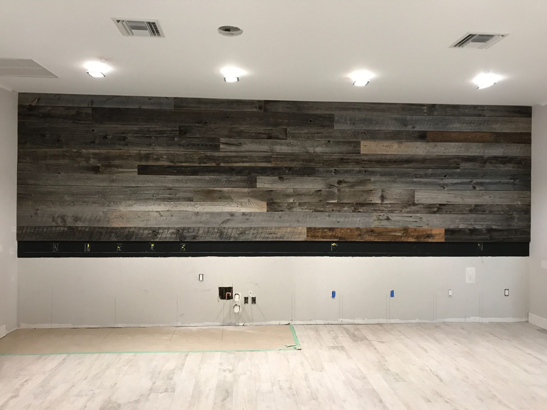 Custom built-in window seat with shelving — luxury carpentry West Palm Beac