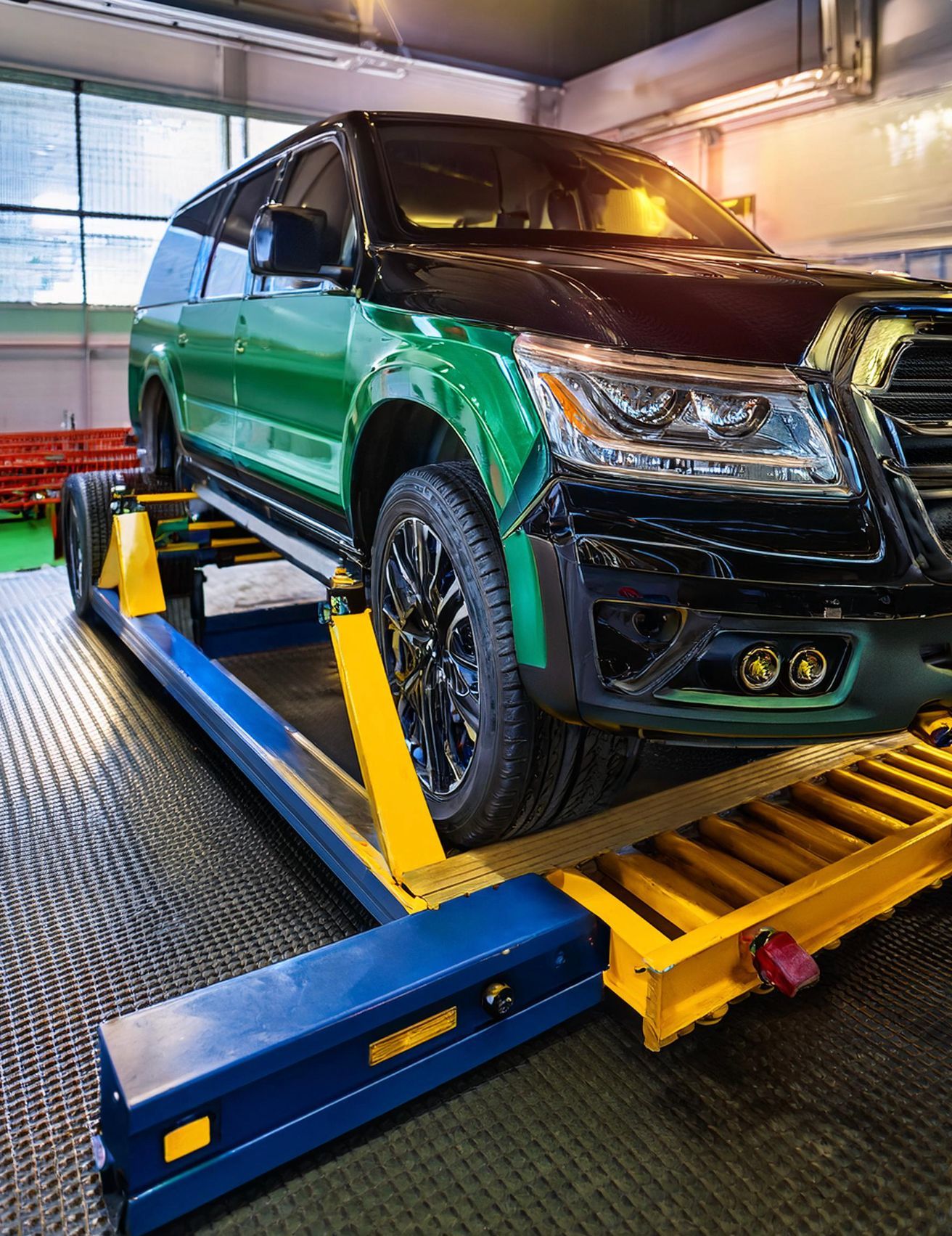 The imager shows a Honda-like vehicle racked on our mechanics' auto repair rack ready for auto repair and maintenance services in Redwood City, CA.
