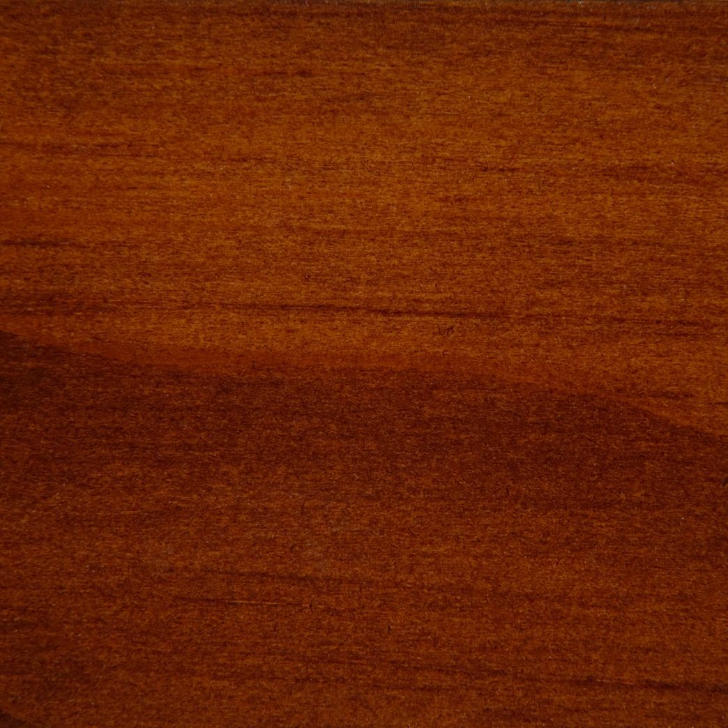 Un gros plan d'un morceau de bois montrant le grain et la texture.