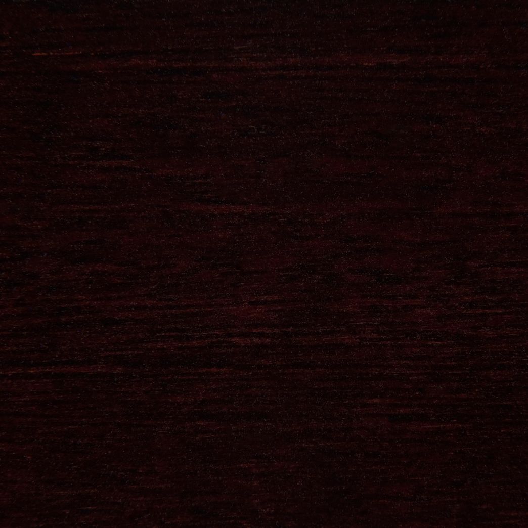 Un gros plan d'une texture de grain de bois brun foncé.