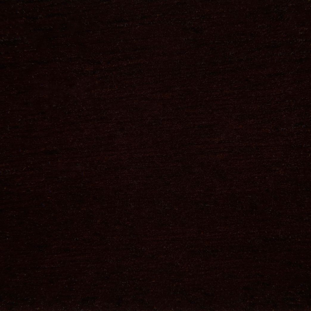 Un gros plan d'une texture de tissu marron foncé.