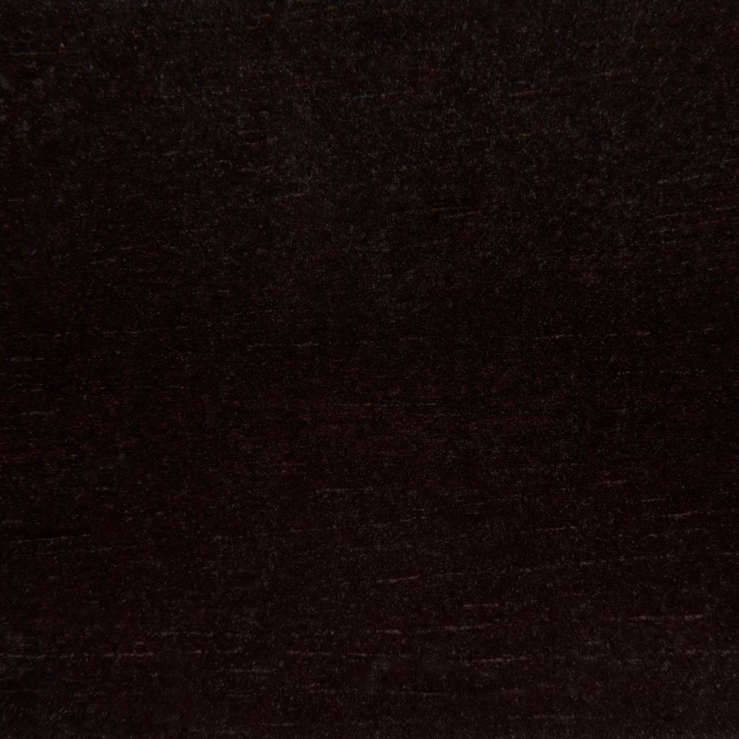 Un gros plan d'une texture de tapis noir.