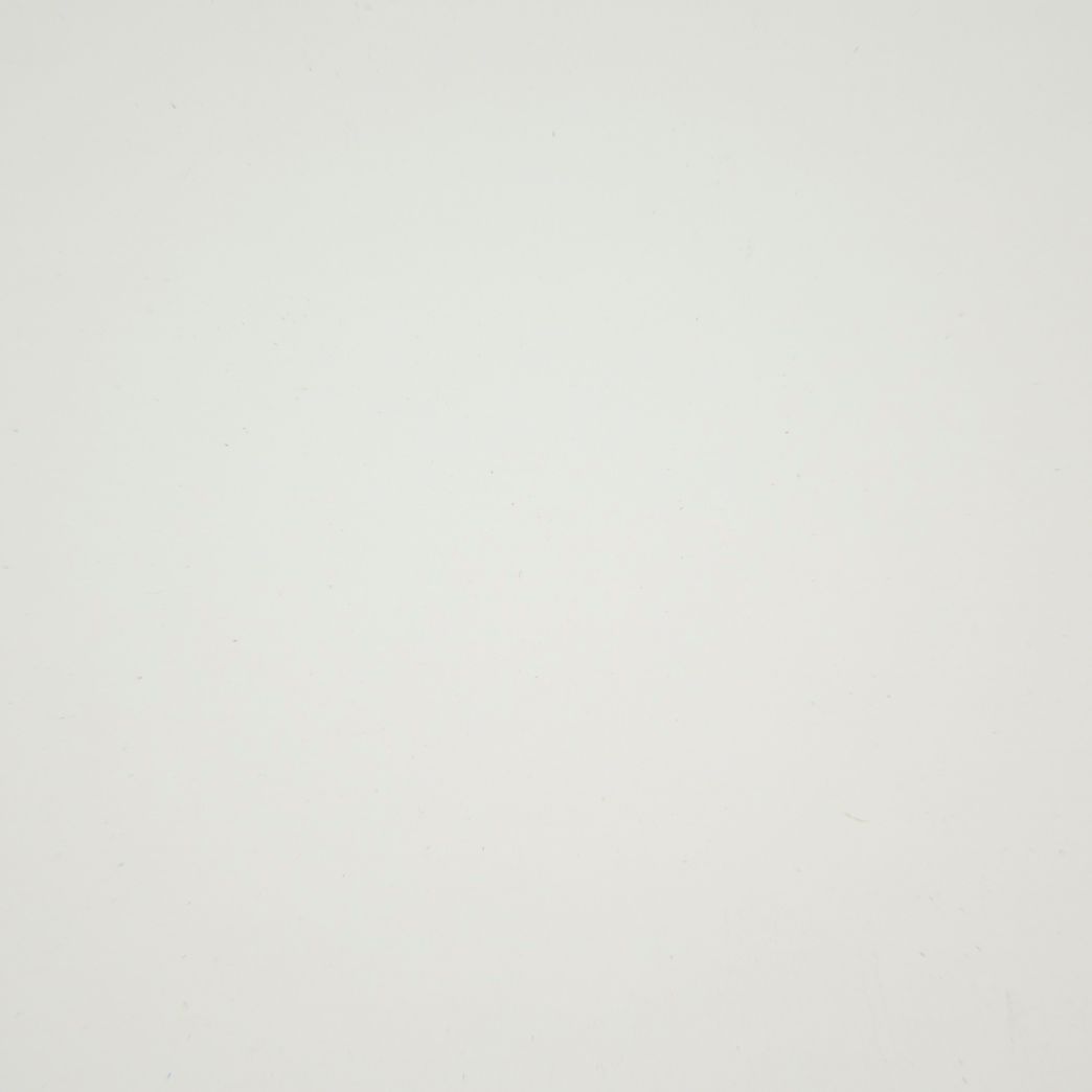 Un gros plan d'une texture de papier blanc.