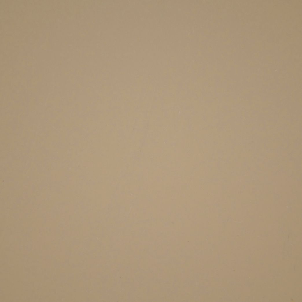 Un gros plan d'une texture de papier beige.