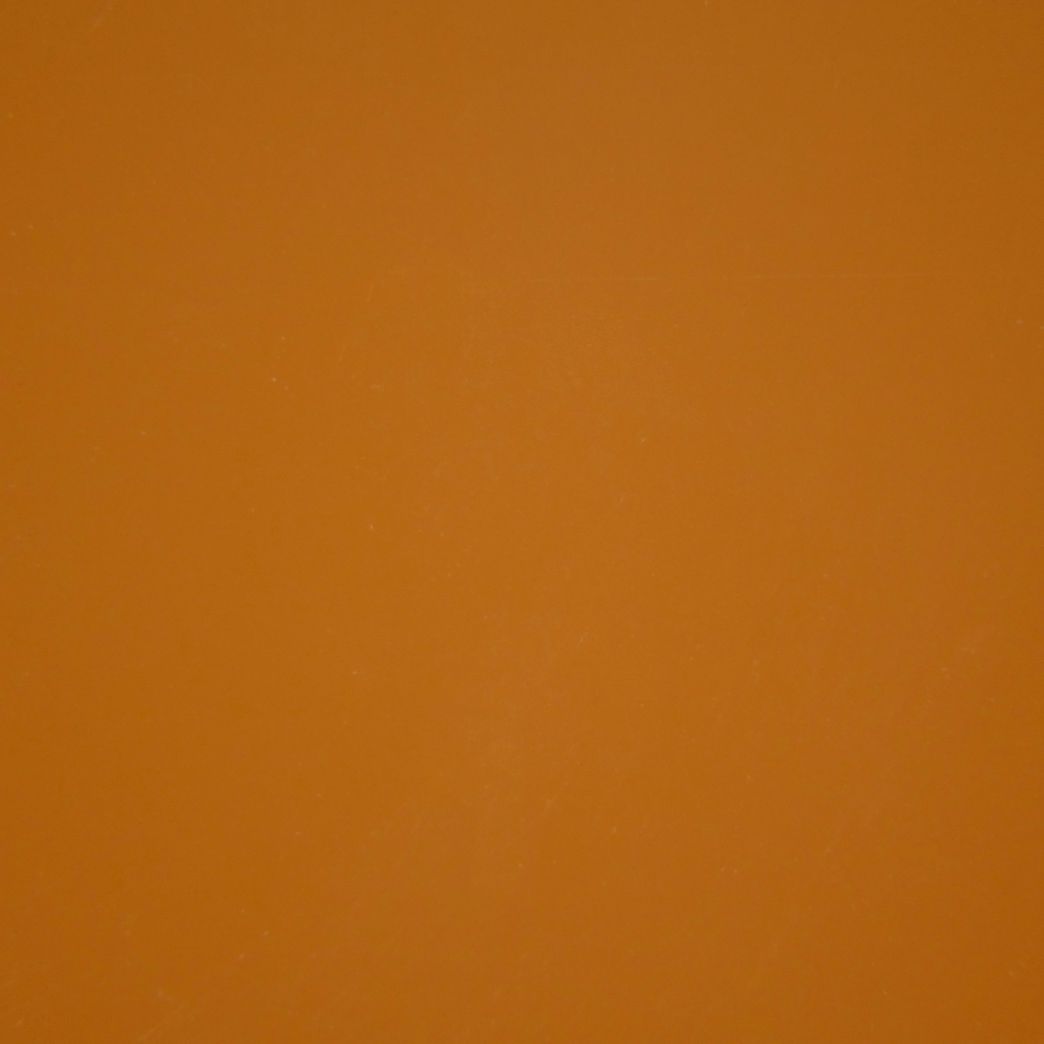 Un gros plan d'un fond marron avec une texture unie.